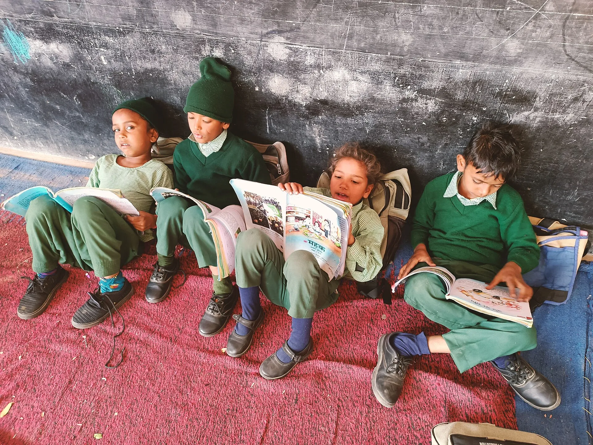 Students reading at a government school (representative image). Photo: Mulkh Singh, CC BY-SA 4.0, via Wikimedia Commons.